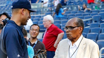 Man saluted as oldest Yankees fan says he's 111, but has no proof of age