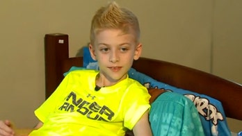 Indiana high school basketball team rallies around national anthem crooner battling cancer