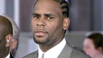 R. Kelly denies he is housing 'cult' of women
