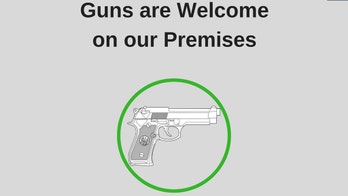 Restaurant sign declaring 'guns are welcome' sparks heated debate