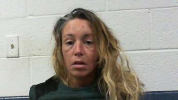 Virginia woman accused of beheading boyfriend, shouting 'let me get my heads'