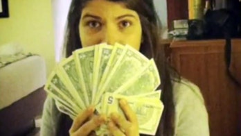 Daughter of Venezuela's Chavez Stirs Controversy With Photo of U.S. Cash
