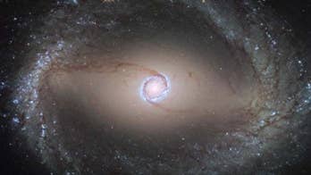 Hubble Telescope sees merging 'David and Goliath' galaxy pair