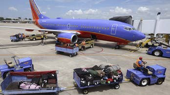 Southwest Airlines: No plans to start charging for checked luggage