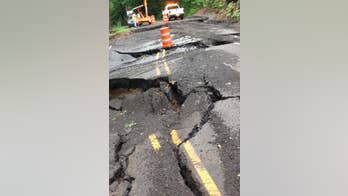 The Latest on severe weather: Tropical Storm Bill weakens to depression, dumps rain on Texas