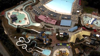 Teen who nearly drowned at Six Flags park taken to hospital in critical condition