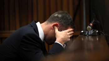 Expert says Steenkamp was standing when Pistorious fired first shot