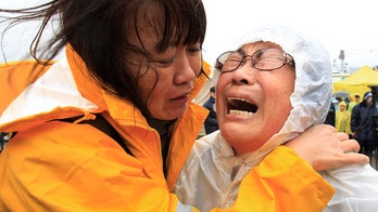 Crew member says order to evacuate South Korea ferry came too late