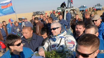 3 space station astronauts return to Earth