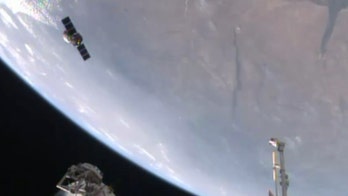 Space station supply ship exits, now packing 3,500 pounds of trash