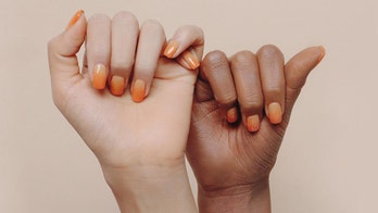 L'Oréal-owned company called 'racist,' accused of using Photoshop to make model's hand appear darker