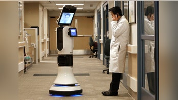 Robots let doctors 'beam' into remote hospitals
