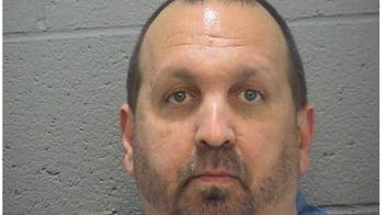 Man arrested after 3 people found shot to death in condominium in North Carolina