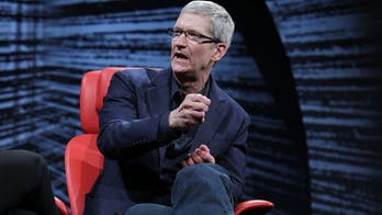 Apple CEO Cook says shareholder suit is 'silly sideshow,' still looking at handing out cash