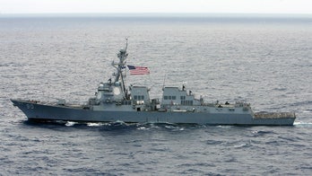 US destroyer sails near China-claimed island in South China Sea
