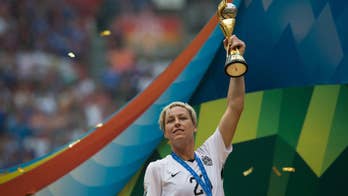 Abby Wambach's World Cup finale ends with American leader lifting championship trophy