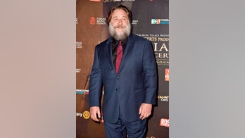 Russell Crowe jokes about his massive beard