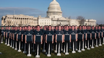 'Army' of 100 Zuckerberg cutouts protests Facebook CEO on Capitol Hill