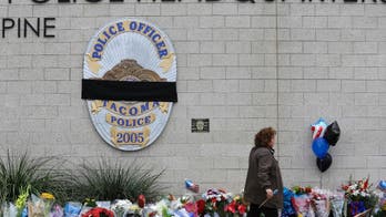The Latest: Police: Shooter impersonated cop at Tacoma mall