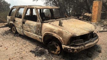 More than 2 dozen large wildfires burn in Western states