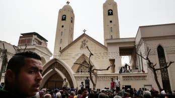 Egypt's Christians bury dead after IS church bombings