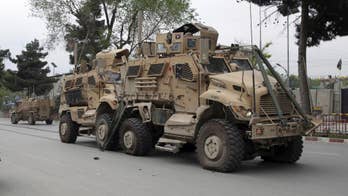 Afghan officials: Suicide attack on convoy kills at least 4