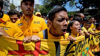 Venezuelan opposition seats lawmakers in challenge to Maduro