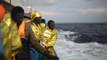 The Latest: France, Germany criticize US migrant block
