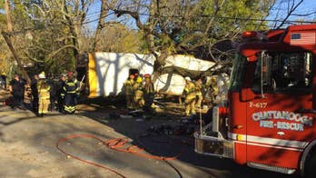 The Latest: Bus driver arrested in fatal school bus crash