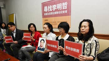 China confirms detention of Taiwanese pro-democracy activist