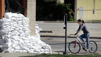Iowa city braces for highest floodwaters since 2008 record