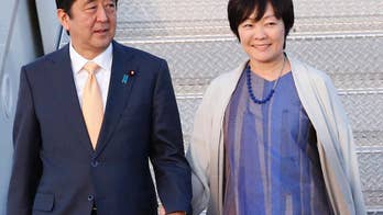 Japan first lady's praise for school removed amid scandal