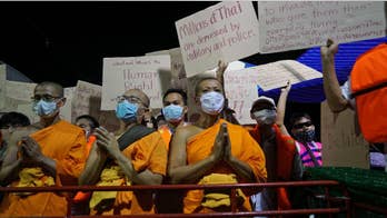 Police hunting for monk increase pressure on Thai temple