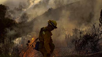 2 big wildfires in LA-area foothills burn toward each other