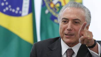 Phone tap adds to pressure on Brazil's interim president
