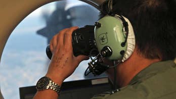 The Latest: Relatives unhappy Flight 370 plane search ends