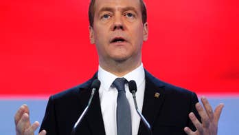 Russia PM calls idea US will lift sanctions soon 'illusion'