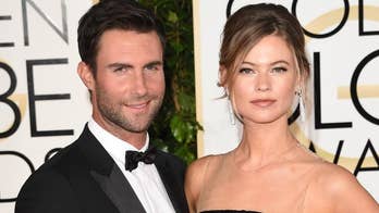 Adam Levine's wife Behati Prinsloo enjoys Miami outing amid rumors couple not invited to Blake, Gwen's wedding