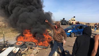Police evict oil pipeline protesters from private land