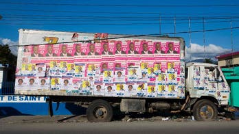 Divided, battered Haiti to hold elections, ready or not