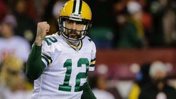 Aaron Rodgers jabs rival quarterbacks amid beer-chugging drama