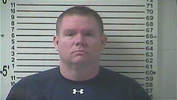 Police: Principal admits stealing porn from student phones