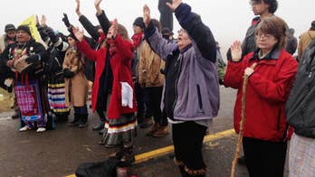 The Latest: 2 sought in alleged attack on reporters