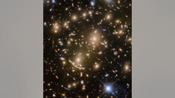 Galaxies from a long time ago and far, far away star in amazing Hubble view