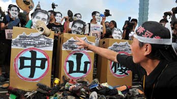 Thousands rally for Taiwan leader's resignation