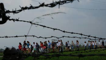 Catholic pilgrims visit Auschwitz ahead of visit by pope