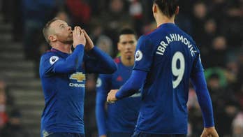 Rooney salvages point for United with club record 250th goal