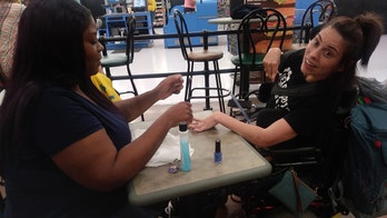 Walmart employee gives disabled customer a manicure after salon denied her