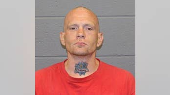 Murder suspect's mugshot shows alleged victim's name tattooed on his neck