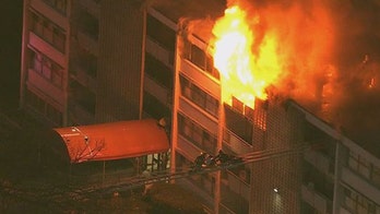 Firefighters pull multiple people from burning Maryland apartment building